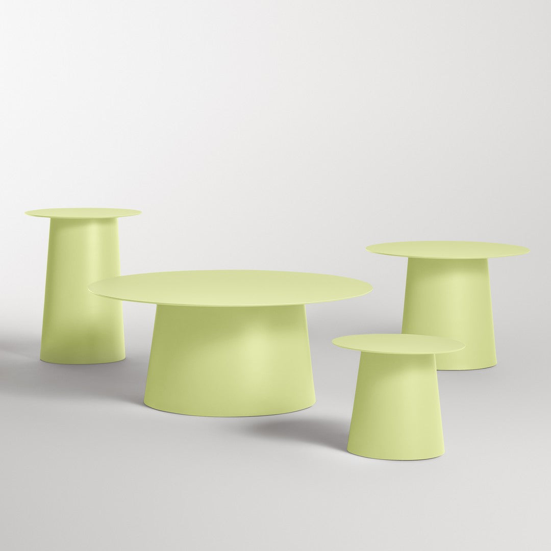 Light green modern table set with minimalist design, featuring smooth surfaces and vibrant, refreshing hues.