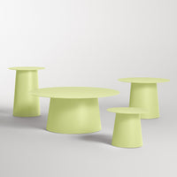 Light green modern table set with minimalist design, featuring smooth surfaces and vibrant, refreshing hues.