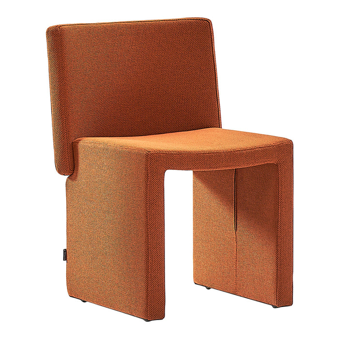 Modern orange chair with a textured weave pattern, ideal for stylish indoor decor.