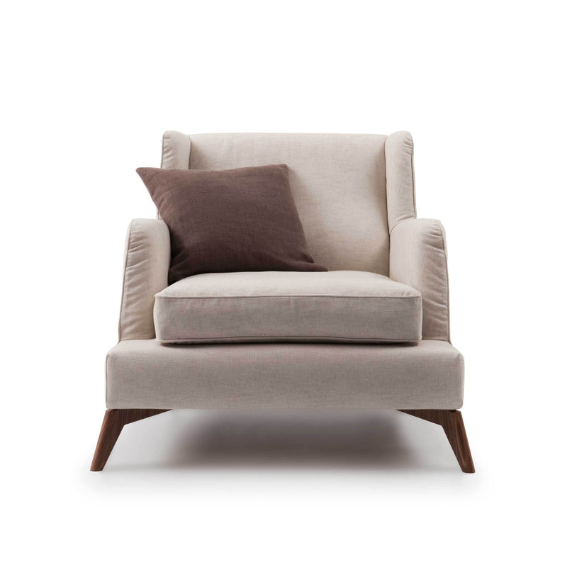 Light beige armchair with a dark brown accent pillow and smooth fabric, featuring clean lines and wooden legs.