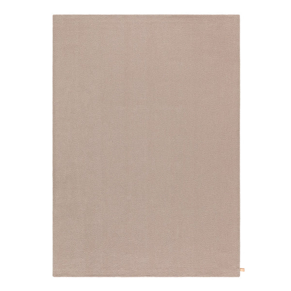 Solid beige area rug with a smooth texture, perfect for neutral color schemes and modern decor.