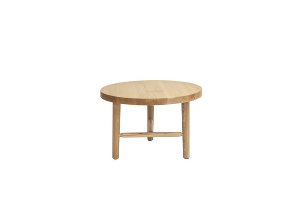 Natural wood round coffee table with a light oak finish and smooth surface, featuring minimalist design and no visible patterns.
