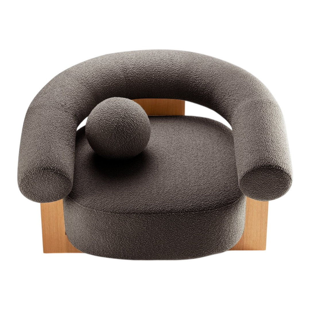 Cozy gray upholstered chair with rounded arms and a spherical accent, featuring a minimalist wooden base.