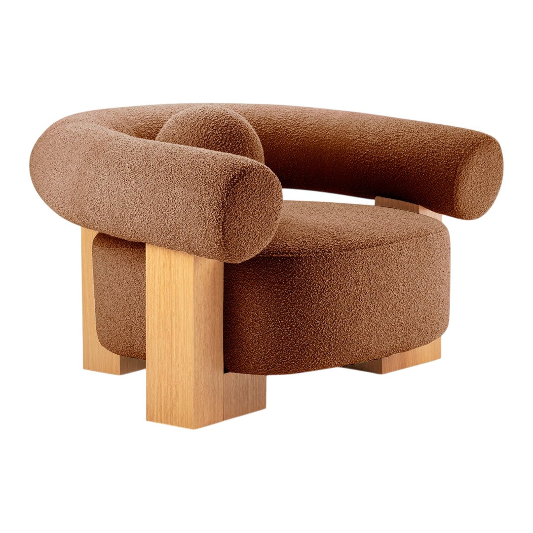"Minimalist brown boucle armchair with rounded shapes and light wood accents."