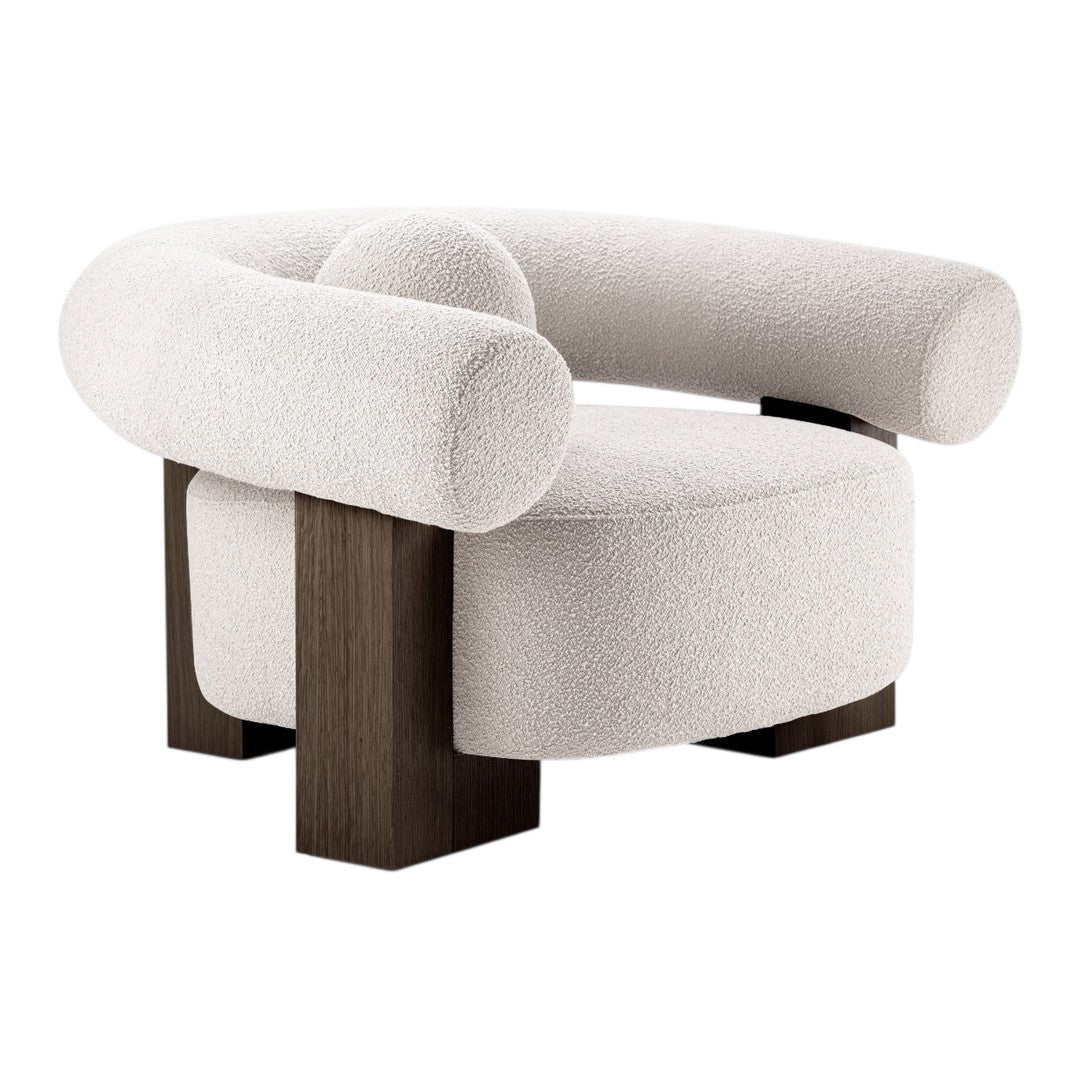 Curvy white boucle chair with dark wood legs, featuring a minimalist design and soft, textured fabric.