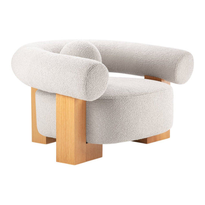 Curved, plush armchair in soft white fabric with light wooden legs, featuring a modern, minimalist design.
