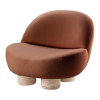 Curved brown chair with a textured fabric and light-colored, round stone legs for a modern, cozy look.