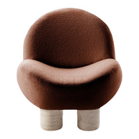 Brown textured chair with a rounded design and light beige cylindrical legs. Modern, cozy aesthetic.