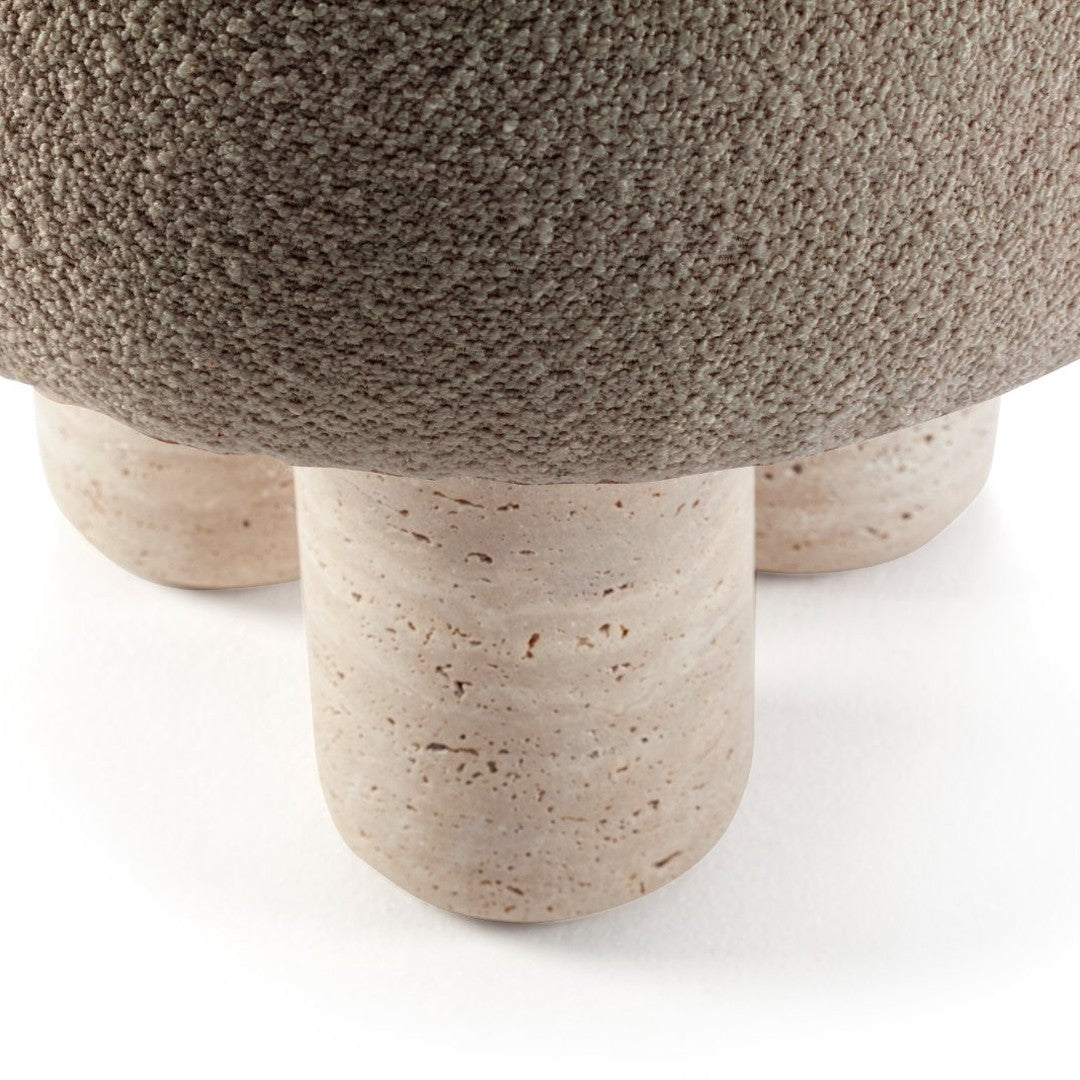 Textured brown fabric with a speckled pattern, complemented by beige cylindrical legs. Ideal for modern decor.