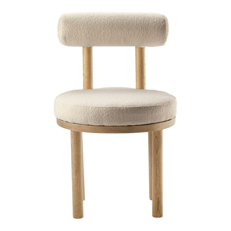 Beige upholstered chair with a round seat and cylindrical backrest, featuring natural wood legs. Soft, minimalist design.