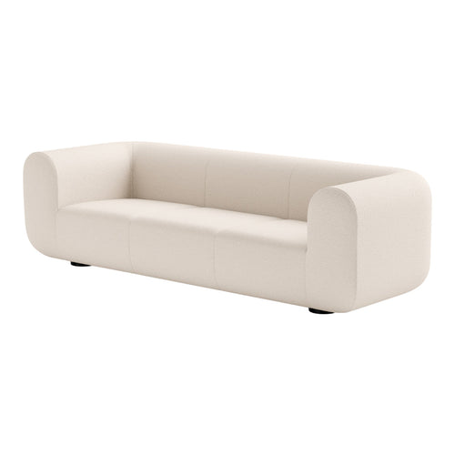 Modern cream upholstered sofa with smooth, minimalist design and rounded edges for a chic, contemporary look.