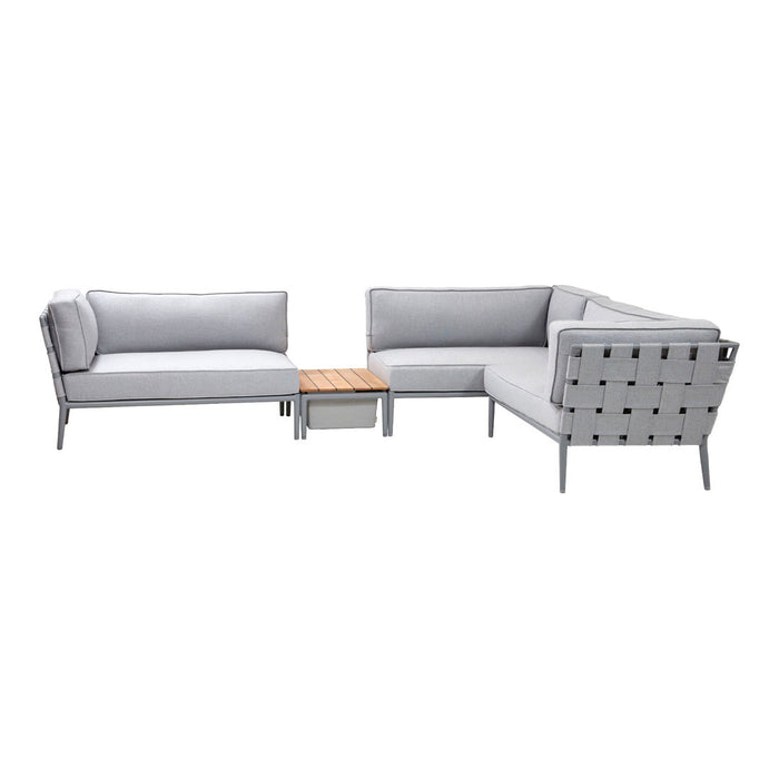 "Modern gray outdoor sectional sofa with a wood-accented coffee table, featuring clean lines and minimalist design."