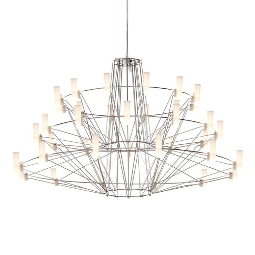 Modern silver chandelier with geometric wire frame and elegant white glass shades.