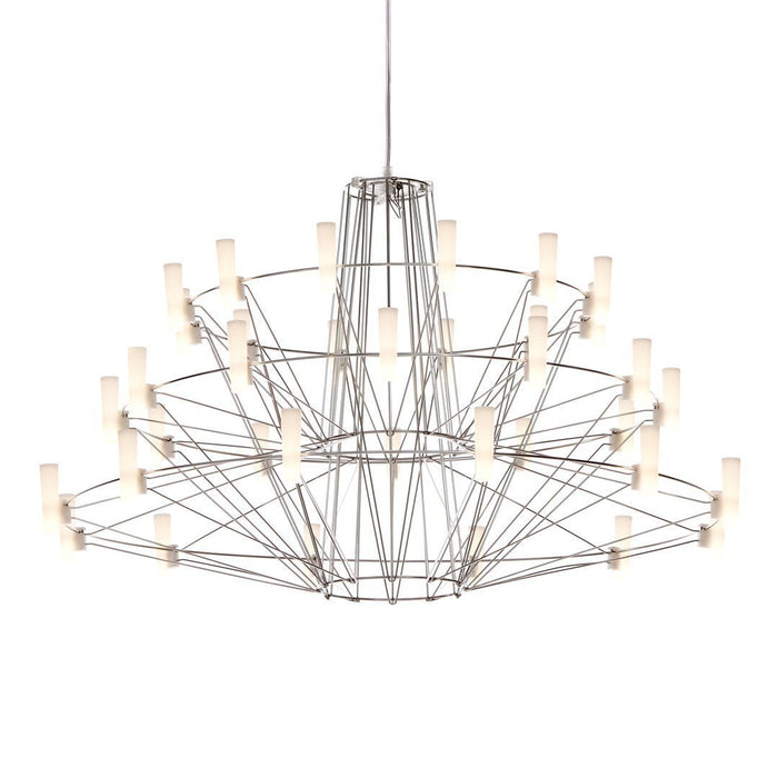 Modern silver chandelier with geometric wire frame and elegant white glass shades.