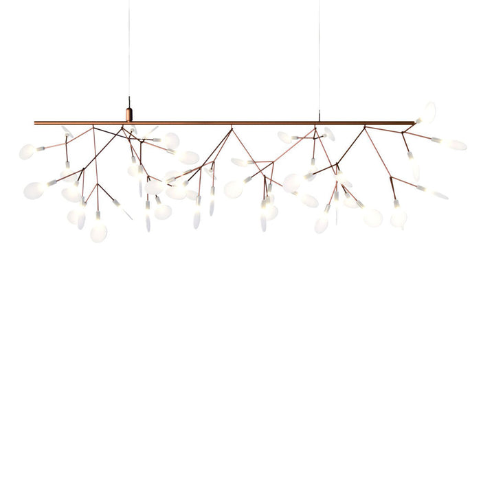 "Modern pendant light with a copper finish and white glass bulb accents, featuring a branch-like design."