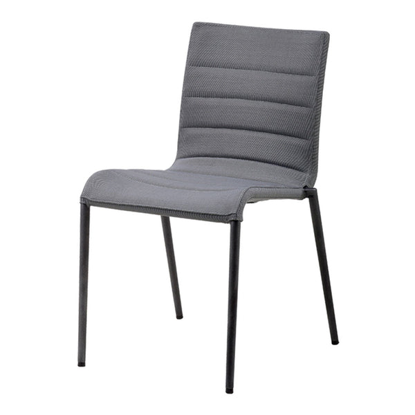 "Modern gray dining chair with a sleek ribbed design and black metal legs, perfect for contemporary spaces."