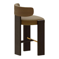 Brown upholstered bar stool with a sleek black frame and gold accents. Modern and minimalistic design.