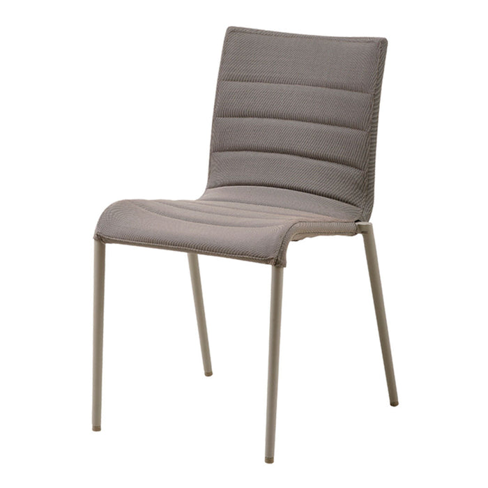 Gray upholstered chair with horizontal stitching and sleek metal legs, perfect for modern decor.