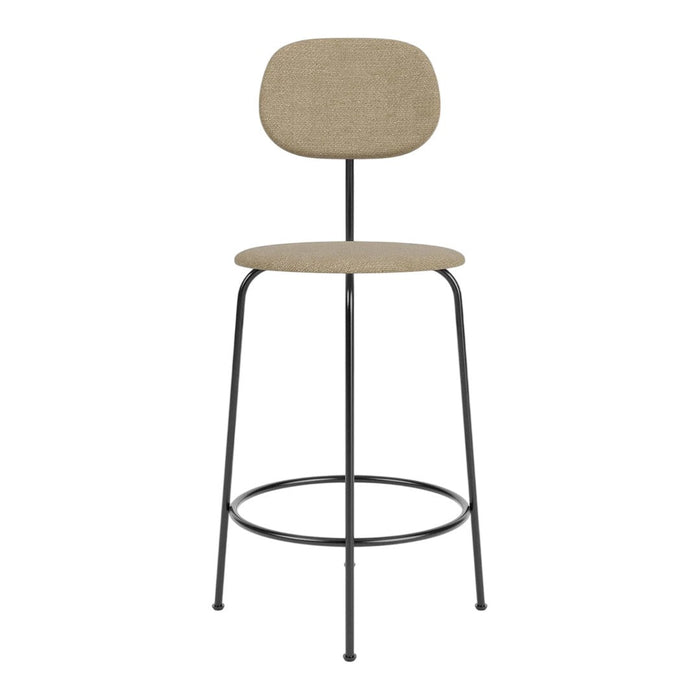Tan fabric stool with a minimalist design and sleek black metal legs, perfect for modern spaces.