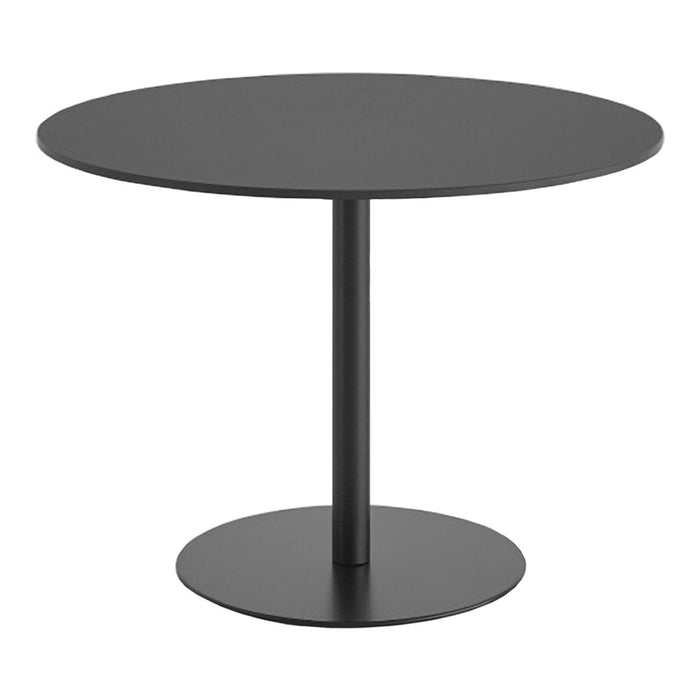 Sleek round black dining table with a minimalist design, featuring a smooth matte finish and sturdy base.