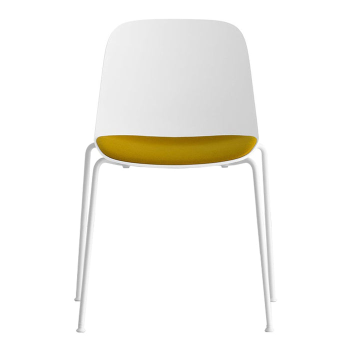 Modern chair featuring a sleek white exterior with a vibrant yellow interior, complemented by minimalist white legs.