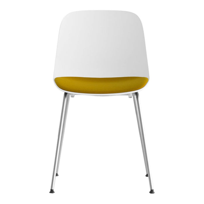 White chair with a vibrant yellow seat and sleek chrome legs, featuring a modern and minimalist design.