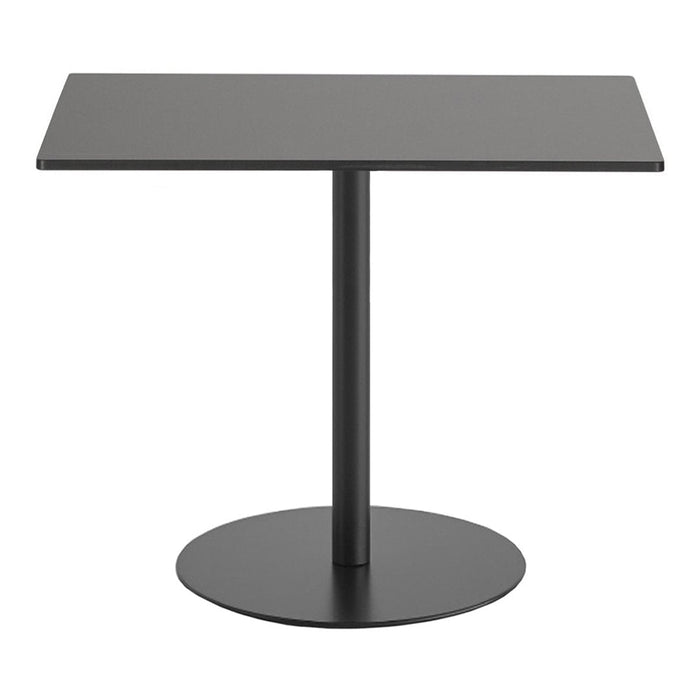 Modern black table featuring a sleek rectangular top and a round base, perfect for contemporary interiors.