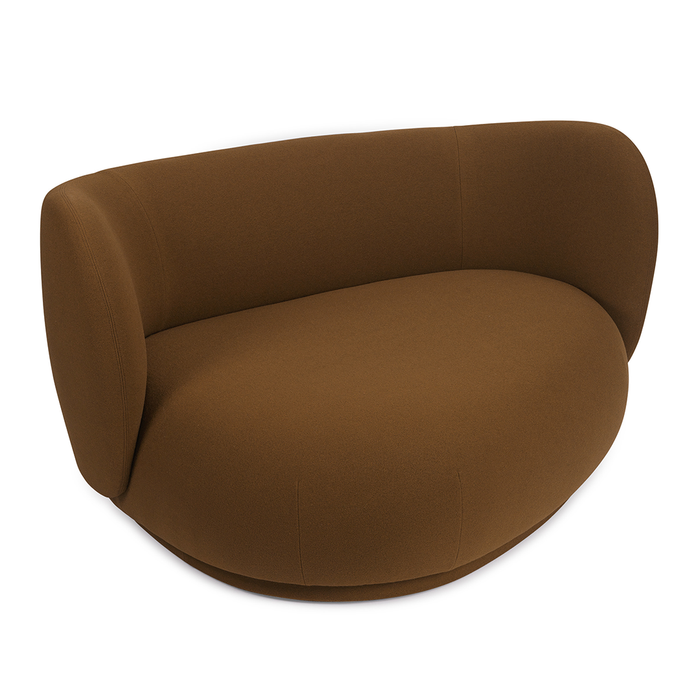 Curved brown sofa with a smooth, minimalist design, perfect for modern living spaces.