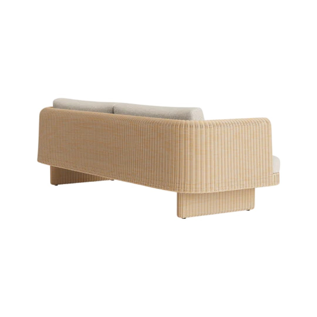 Beige textured couch with subtle ribbed pattern and light gray cushions for a modern aesthetic.