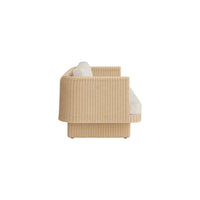 Beige striped upholstered sofa with curved design and white cushions. Ideal for modern and stylish interiors.
