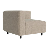 Beige modular sofa section with a textured fabric, featuring a minimalist design and sleek black legs.