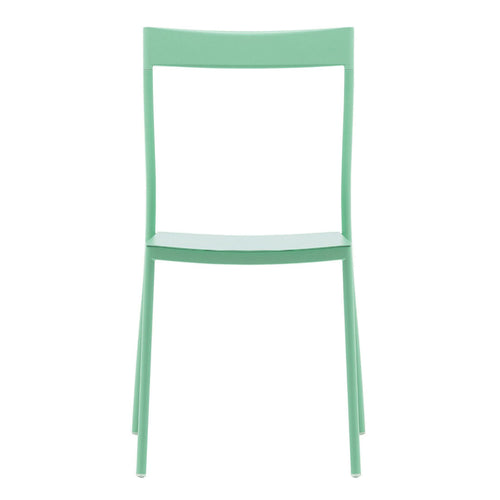 Mint green dining chair with a minimalist design and smooth finish. Perfect for modern decor.