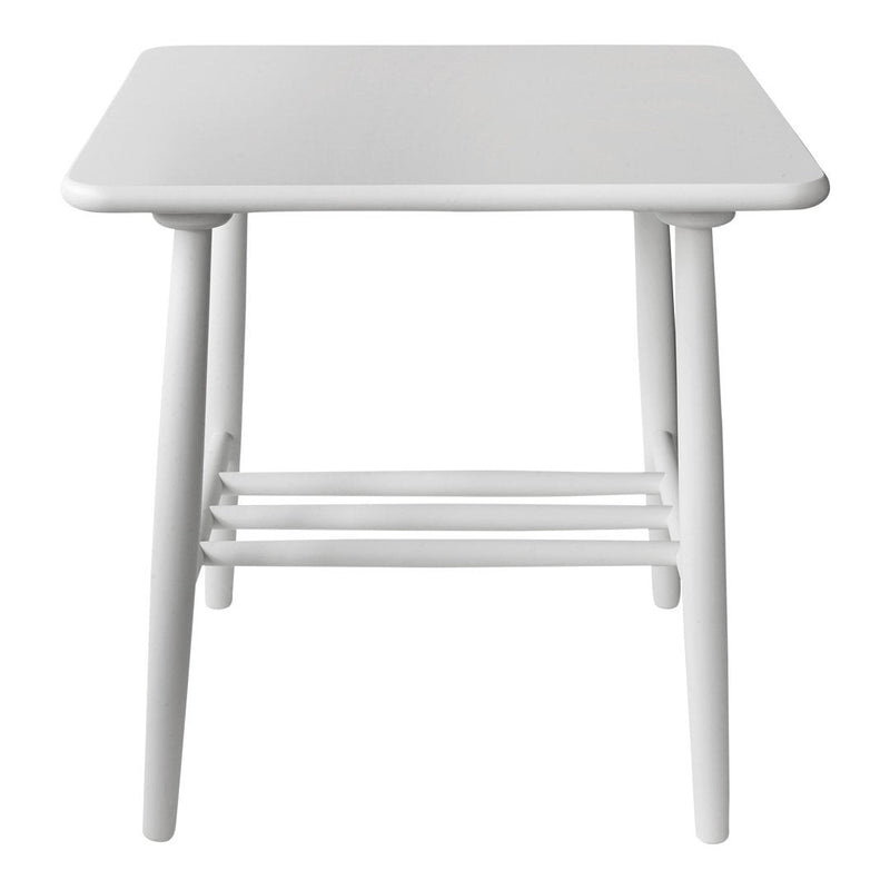 White square table with smooth surface and minimalist design, featuring light-colored wooden legs.
