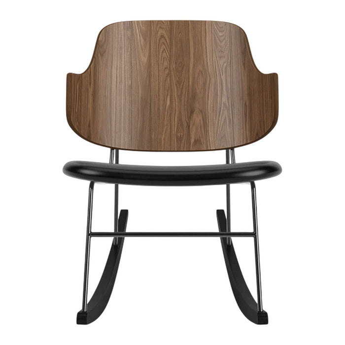 Brown wood backrest on a sleek black rocking chair, highlighting a modern, minimalist design.