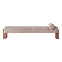 Beige fabric chaise lounge with a minimalist design and wooden legs, featuring a rounded bolster for added style.