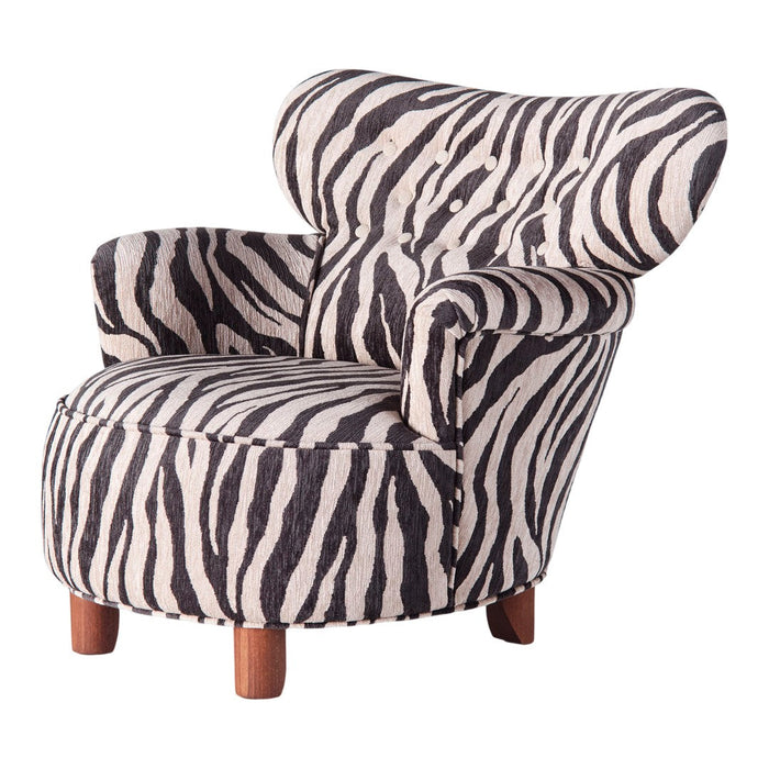 Black and white zebra print accent chair with a plush design and wooden legs.