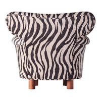 Black and white zebra stripe patterned chair with rounded back and wooden legs. Stylish and bold statement piece.