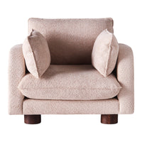 Beige textured armchair with two plush cushions and dark wooden legs. Cozy and minimalist design for modern interiors.