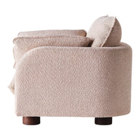 Textured beige sofa with a rounded design and a cozy, plush finish. Perfect for modern interiors.