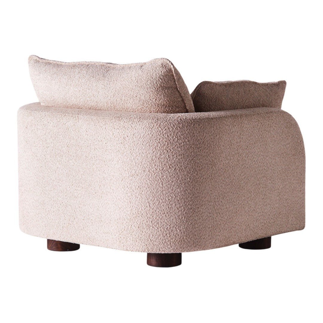 Beige textured sofa with rounded corners and wooden legs, featuring a cozy, soft fabric pattern.