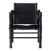 Black folding chair with a sleek matte finish and minimalist design, featuring solid fabric and sturdy frame.