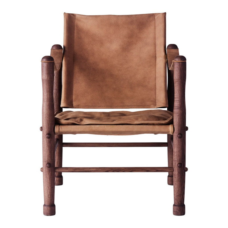 Brown suede armchair with wooden frame, featuring a simple, rustic design and smooth textures.