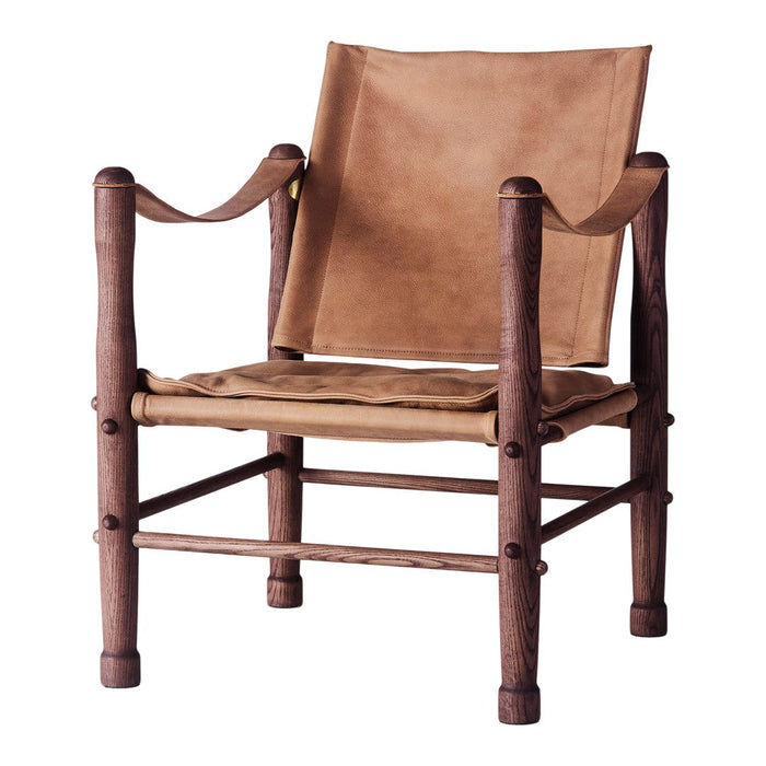 Rustic wooden chair with a warm brown suede seat and backrest, featuring simple, natural design elements.