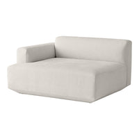 Modern beige couch with a minimalist design, featuring a smooth, solid texture and clean lines.