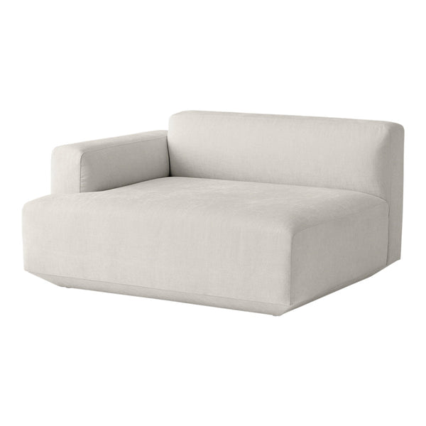 Modern beige couch with a minimalist design, featuring a smooth, solid texture and clean lines.