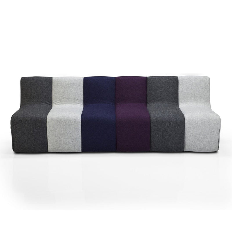 Multi-colored modern sofa featuring gray, navy, and purple fabrics in a geometric pattern. Ideal for contemporary decor.
