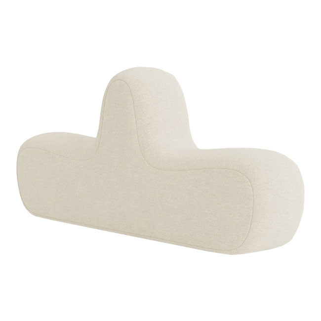 Beige abstract-shaped bolster pillow with a smooth, textured fabric. Ideal for modern home decor.