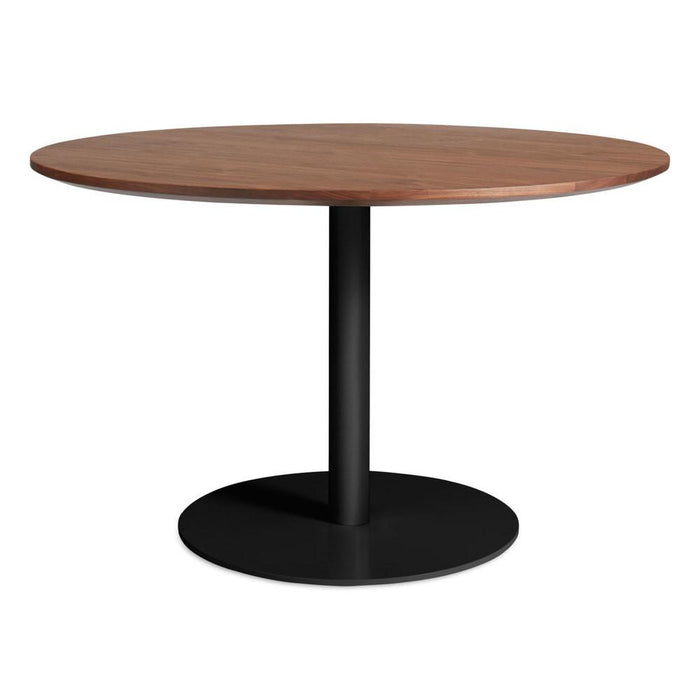 Round wood dining table with a warm walnut finish and sleek black metal base for a modern look.