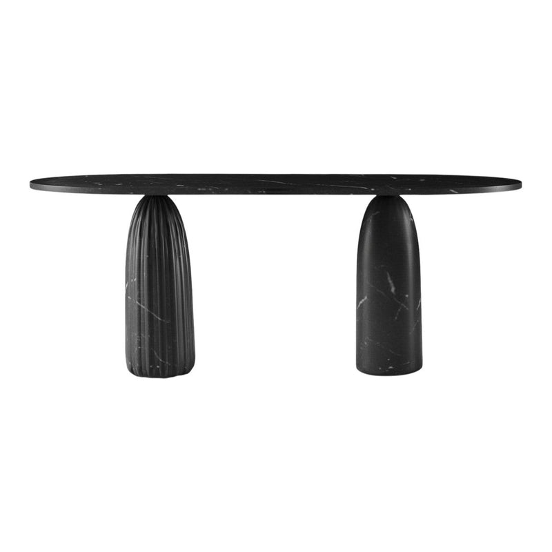 Black oval marble table with ribbed cylindrical bases, featuring a sleek modern design and polished finish.