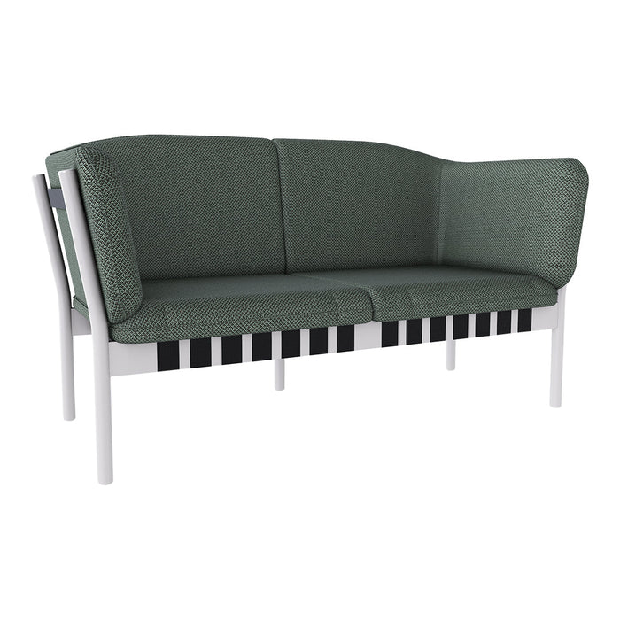 Green two-seater sofa featuring a textured fabric and a striking black and white piano-key design on the base.
